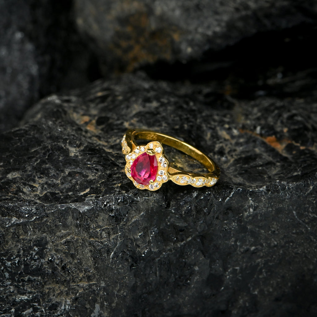 Radiate timeless elegance with this Natural Pear Cut Ruby Ring in Sterling Silver, crafted to capture beauty, passion, and sophistication.