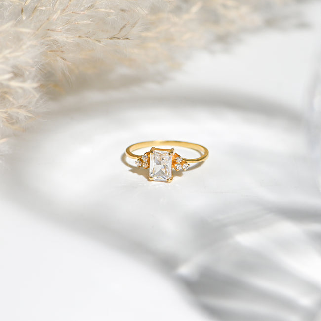 Experience timeless elegance with this radiant cut moissanite ring in sterling silver, crafted to sparkle brilliantly for every occasion. Hover Image